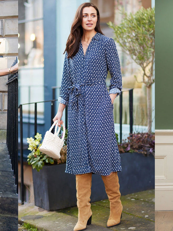 Three sustainable dresses from Unfolded archive sale. Models wearing a blue sustainable bias-cut dress, a scribble navy blue long-sleeve dress and a colourful print short sleeve dress in a combined image.
