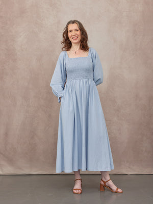 _0000s_0000_C23-Sam-Shirred-Dress-Blue-CUSTOMER-04.jpg