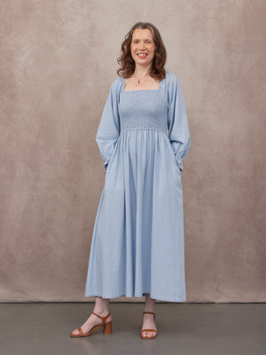 _0000s_0001_C23-Sam-Shirred-Dress-Blue-CUSTOMER-03.jpg
