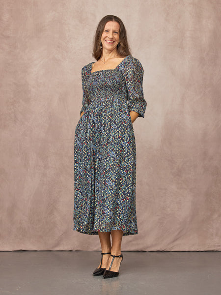 Claire wears size 8 Regular