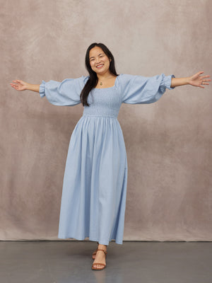 _0000s_0003_C23-Sam-Shirred-Dress-Blue-CUSTOMER-01.jpg