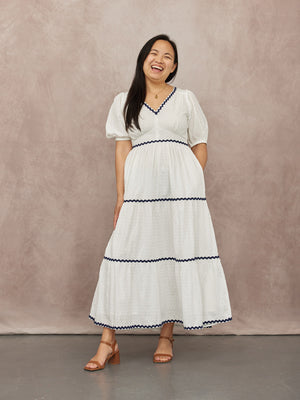 _0000s_0004_C23-Nelly-Ric-Rac-Dress-White-Navy-CUSTOMER-02.jpg