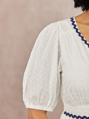 _0000s_0009_C23-Nelly-Ric-Rac-Dress-White-Navy-DETAIL-02.jpg