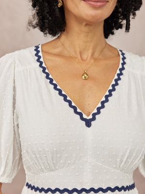 _0000s_0010_C23-Nelly-Ric-Rac-Dress-White-Navy-DETAIL-01.jpg