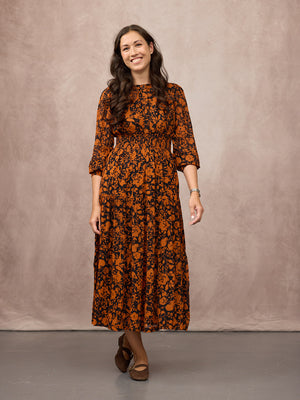 _0000s_0011_C25-Eleanor-Tiered-Skirt-Dress-Orange-Black-Floral-Print-CUSTOMER-04.jpg