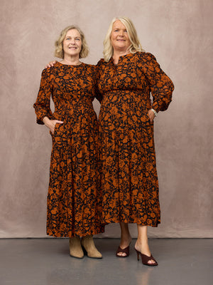 _0000s_0012_C25-Eleanor-Tiered-Skirt-Dress-Orange-Black-Floral-Print-CUSTOMER-03.jpg
