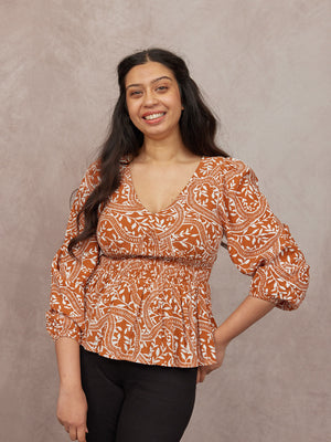 _0000s_0015_C24-Yara-Long-Sleeve-V-Neck-Top-Burnt-Orange-and-Ecru-Block-Print-CUSTOMER-01.jpg