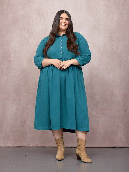 Lucy wears size 24 Regular