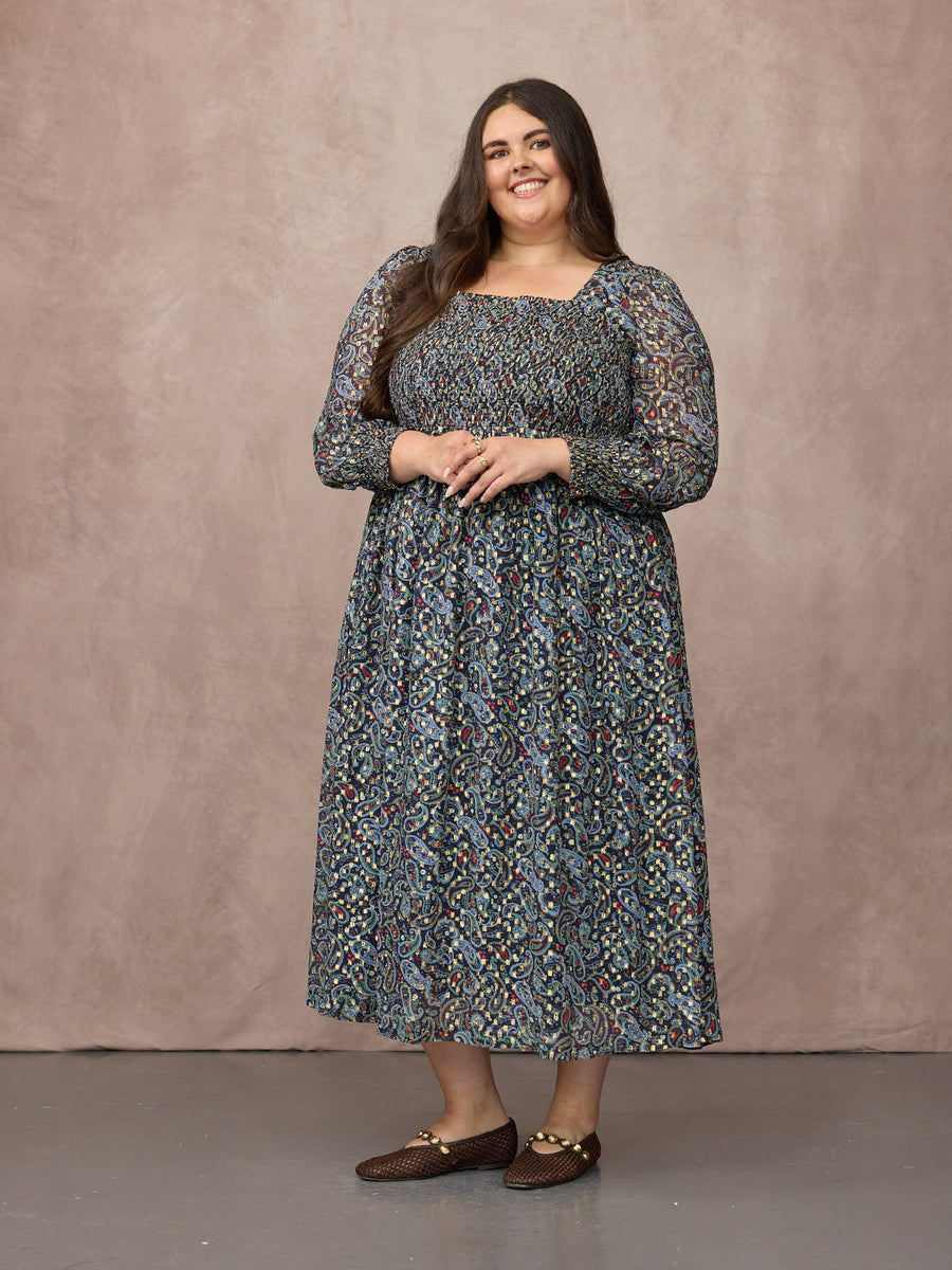 Lucy wears size 24 Regular