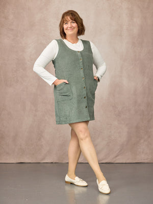 _0001s_0001_C26-Sandie-Round-Neck-Cord-Pinafore-Dress-Light-Green-LIFESTYLE-03.jpg
