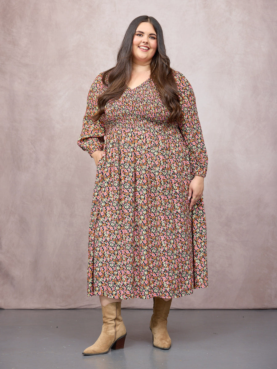 Lucy wears size 24 Regular