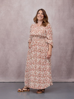 _0002s_0007_C25-Vera-Midi-Dress-Terracotta-&-Ecru-Floral-Print-CUSTOMER-04.jpg