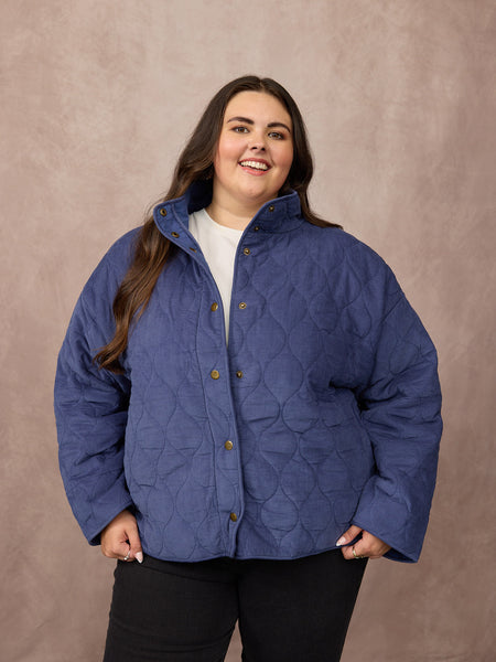 Lucy wears size XL