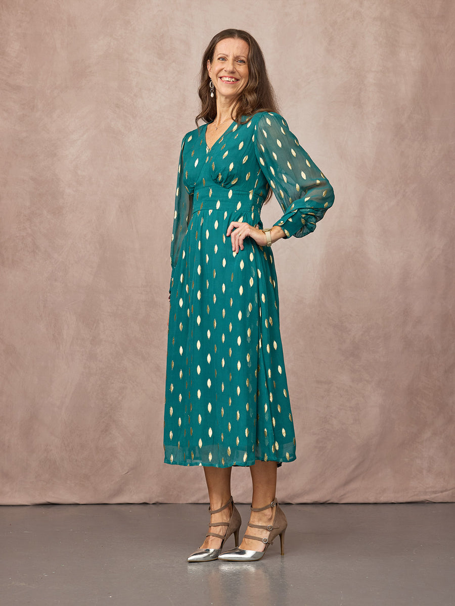 Claire wears size 8 Regular