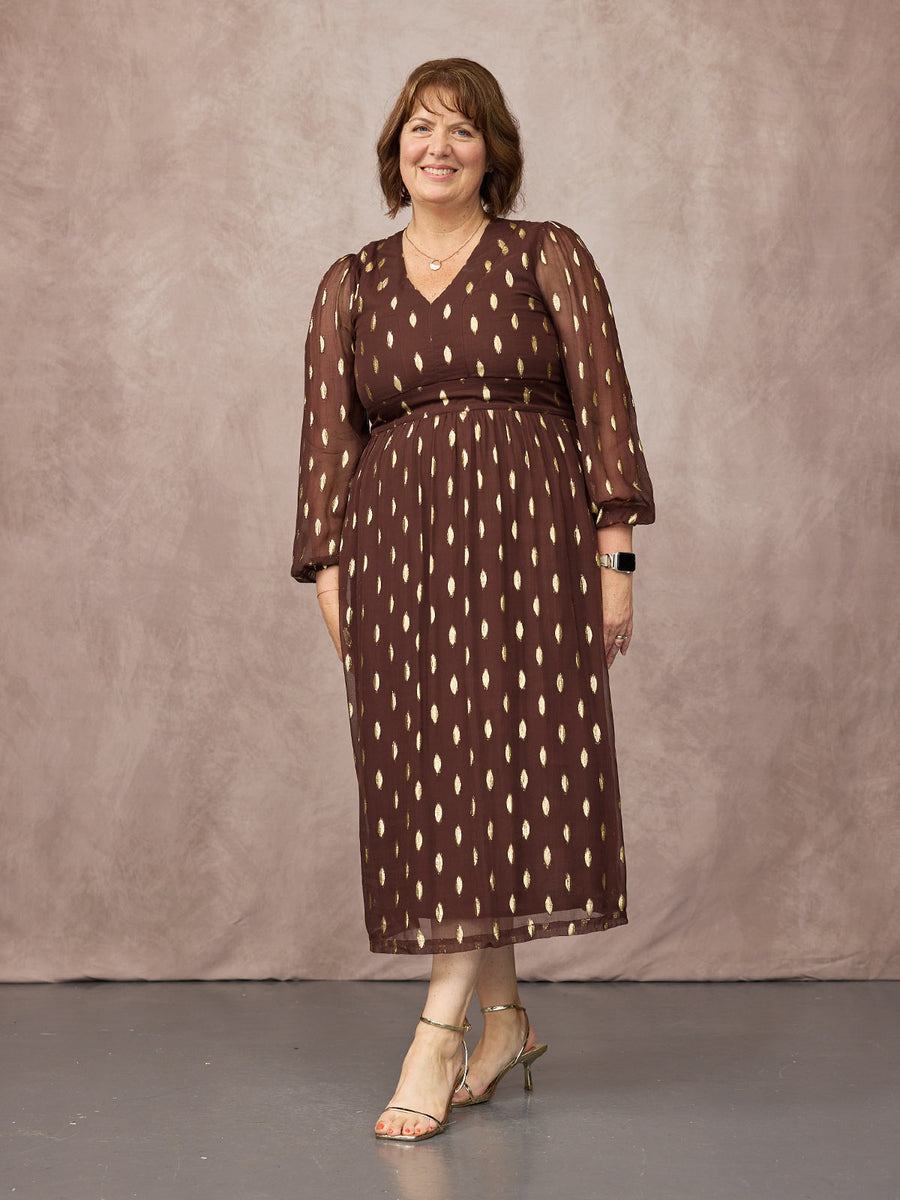Christine wears size 14 Regular