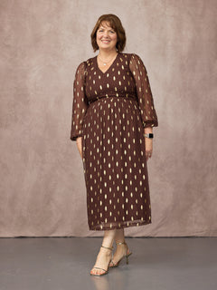 Christine wears size 14 Regular