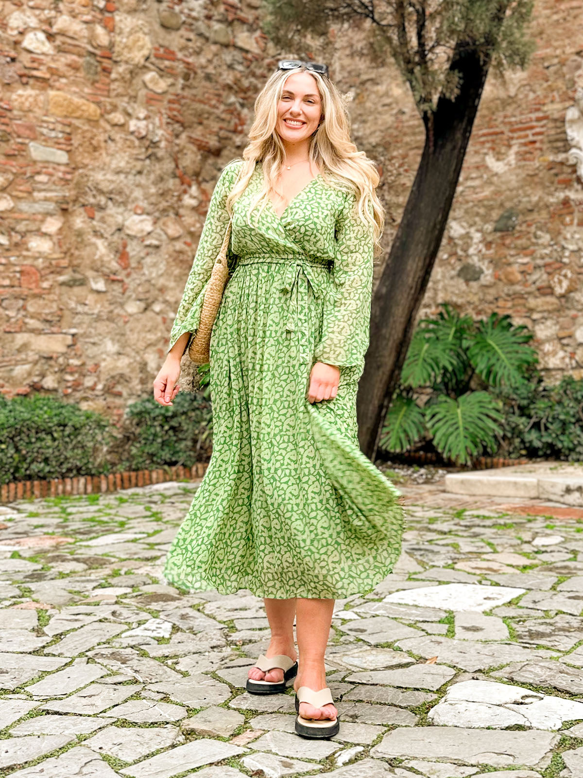 Model lifestyle shot, wearing the Dora Green Print dress