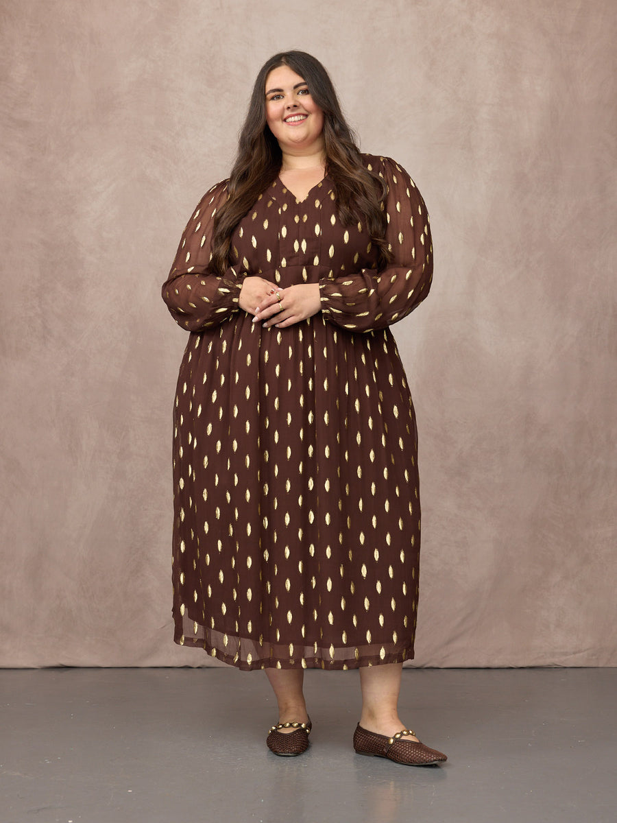 Lucy wears size 24 Regular