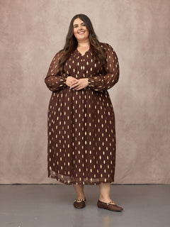 Lucy wears size 24 Regular