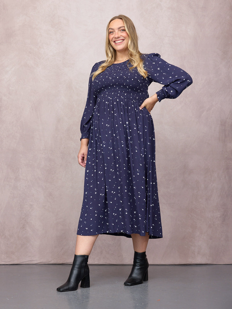 Lucy wears size 18 Regular