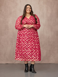 Lucy wears size 24 Regular