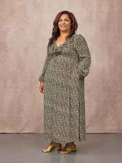 Natasha wears size 14 Regular