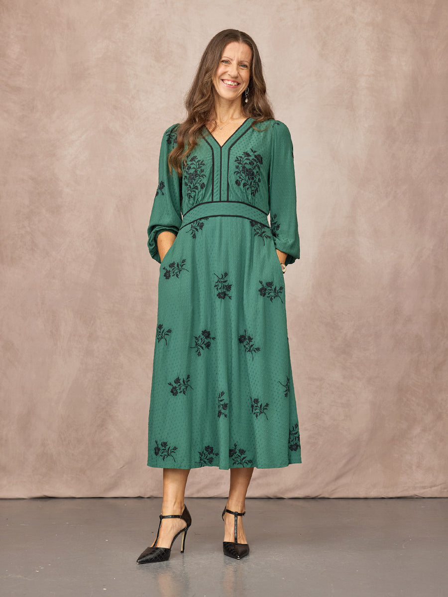 Claire wears size 8 Regular
