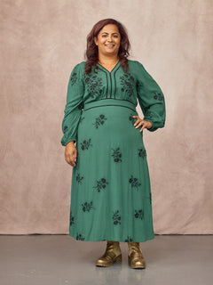 Natasha wears size 14 Regular