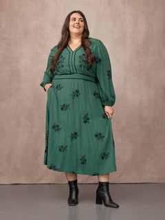 Lucy wears size 24 Regular