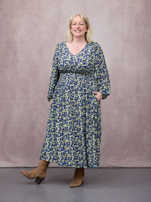 _0007s_0008_C25-Maddie-Long-Sleeve-Dress-Navy-&-Green-Leaf-Print-CUSTOMER-03.jpg