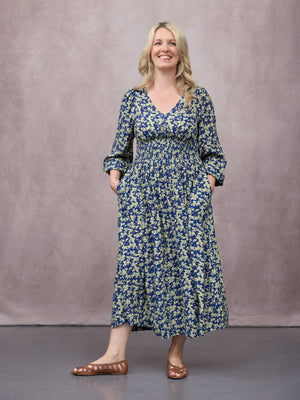 _0007s_0010_C25-Maddie-Long-Sleeve-Dress-Navy-&-Green-Leaf-Print-CUSTOMER-01.jpg