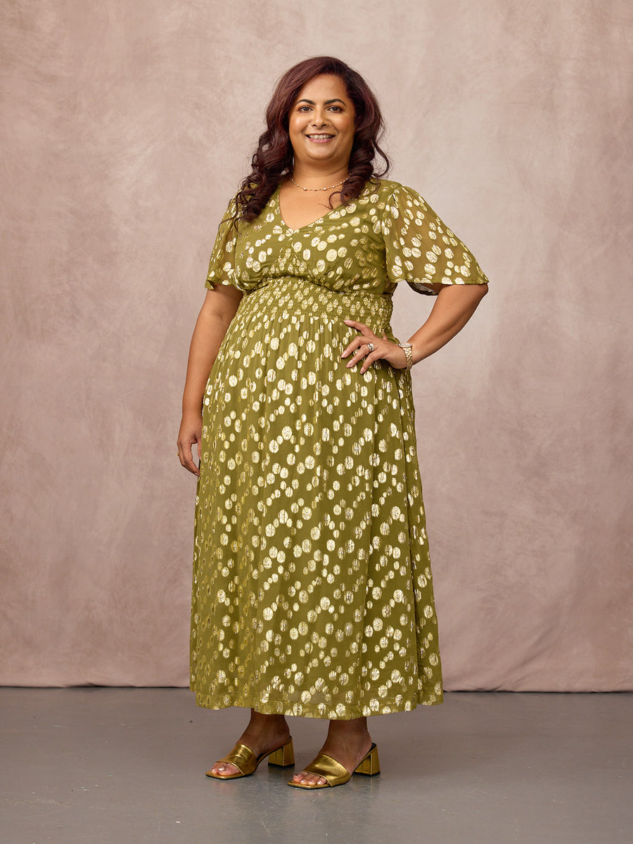 Natasha wears size 18 Regular