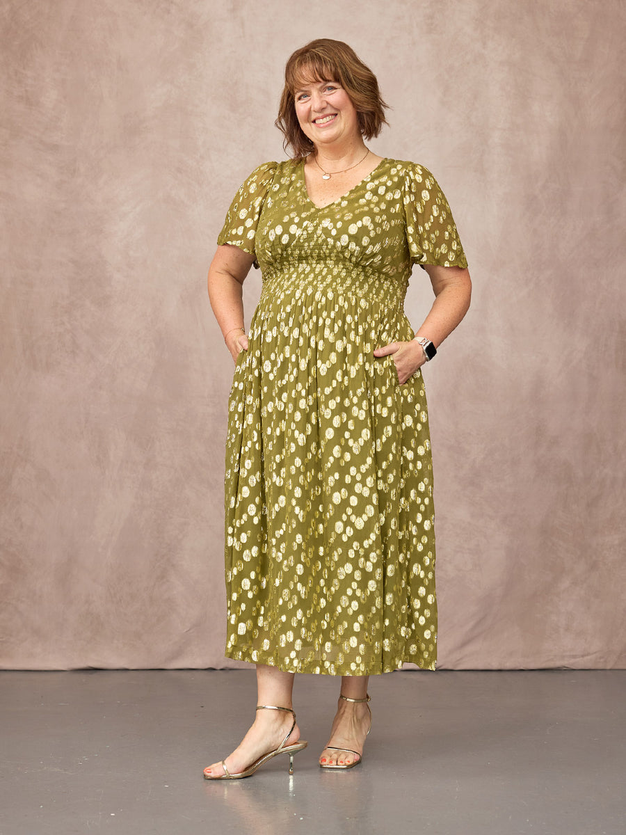 Christine wears size 18 Regular