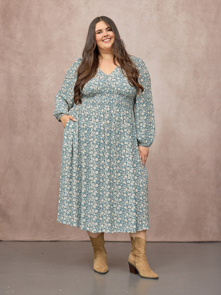 Lucy wears size 24 Regular