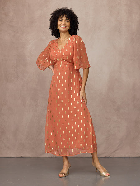 Trish wears size 8 Regular