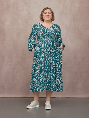 _0009s_0018_C24-Maddie-V-Neck-Long-Sleeve-Dress-Abstract-Animal-Green-and-Ecru-Print-CUSTOMER-03.jpg
