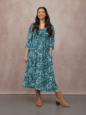 _0009s_0020_C24-Maddie-V-Neck-Long-Sleeve-Dress-Abstract-Animal-Green-and-Ecru-Print-CUSTOMER-05.jpg