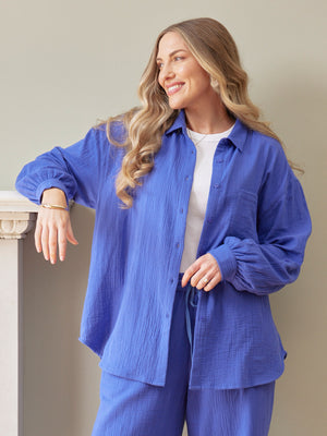 Deborah Oversized Cotton Crinkle Shirt in cobalt blue, worn open over white tee with matching trousers