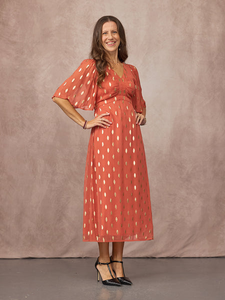 Claire wears size 8 Regular