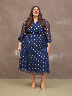 Lucy wears size 24 Regular