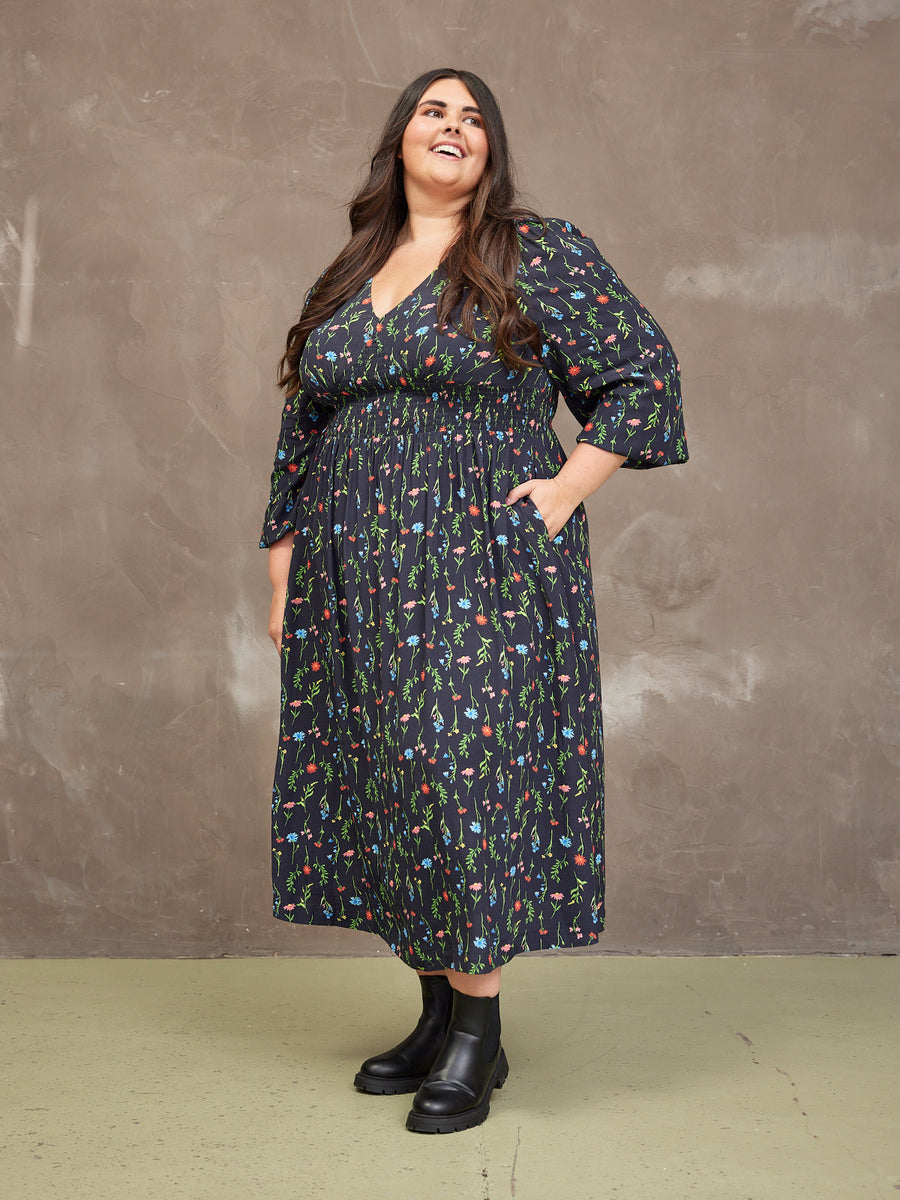 Lucy wears size 24 Regular