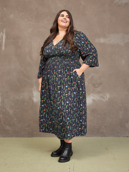 Lucy wears size 24 Regular
