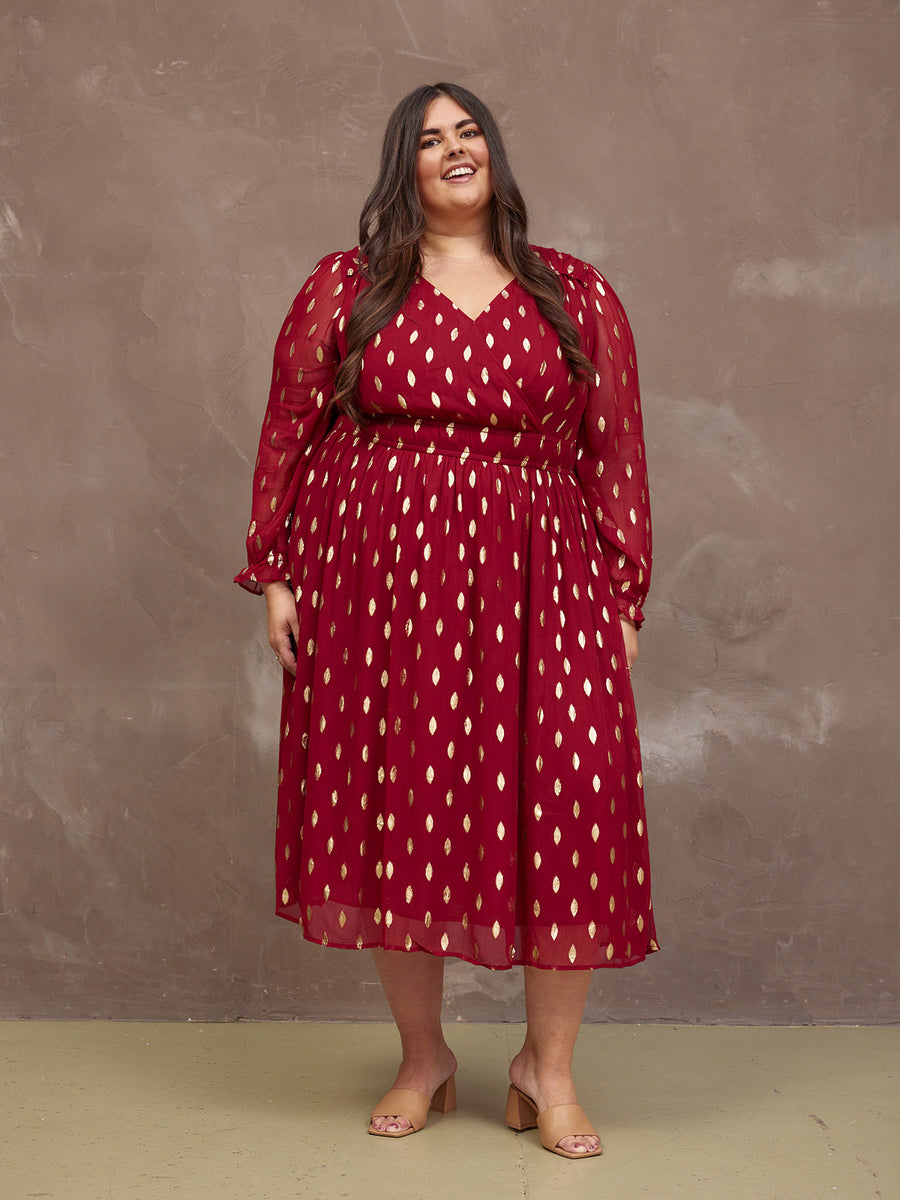 Lucy wears size 24 Regular