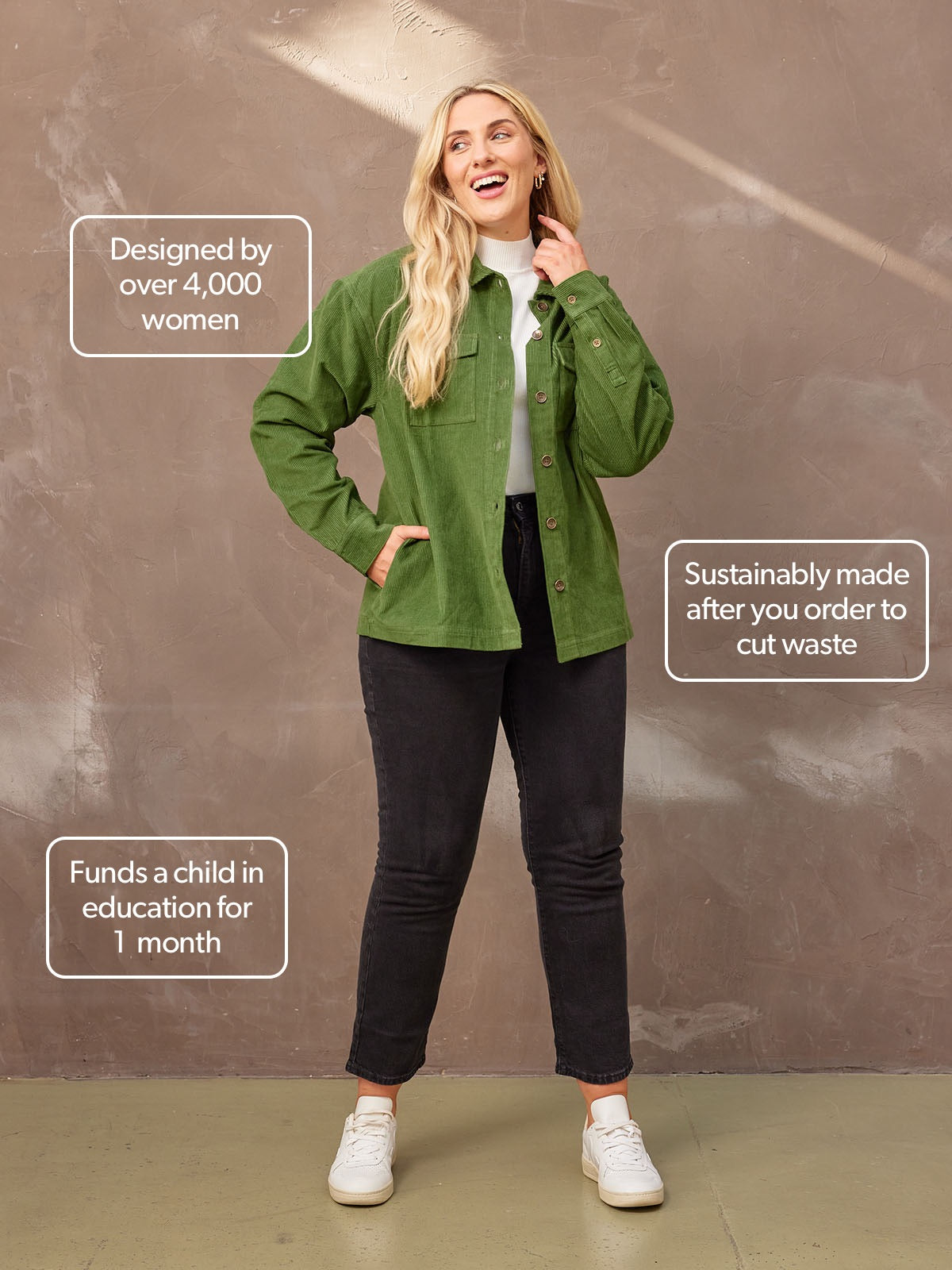 Smiling model looking to the side wearing the sustainable Yasmynn shacket in  olive, paired with a white top and black trousers. Picture features text bubbles with benefits.