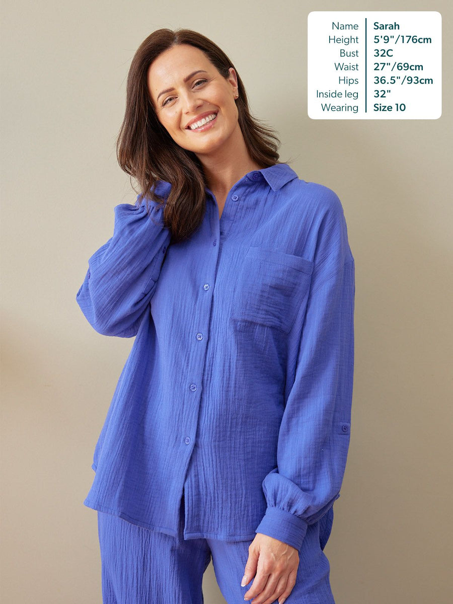 Deborah Oversized Cotton Crinkle Shirt in cobalt blue, worn buttoned-up with matching trousers,