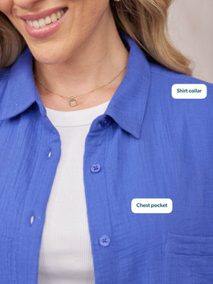 Deborah Oversized Cotton Crinkle Shirt in cobalt blue, worn open over white top, showing shirt collar and chest pocket.