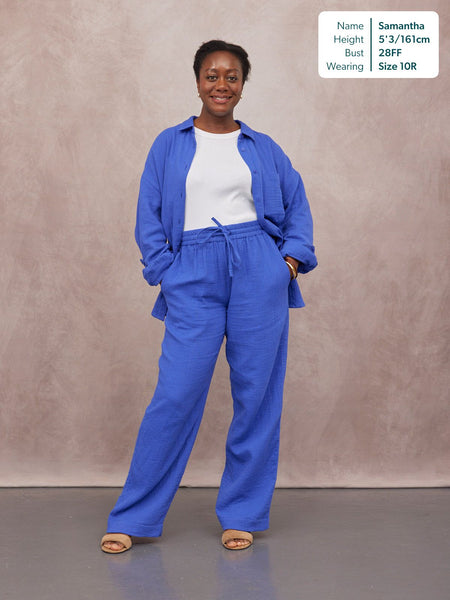 Joy Cotton Crinkle Trouser in cobalt blue with drawstring waist, worn full-length with matching blue shirt and white top.