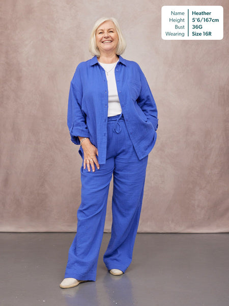 Joy Cotton Crinkle Trouser in cobalt blue, wide-leg with drawstring waist, worn with matching blue shirt and white top.