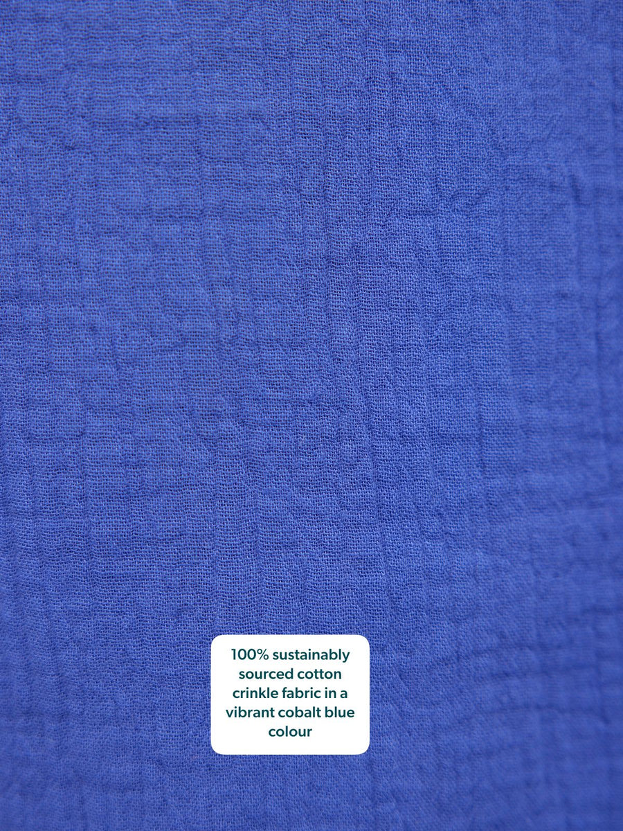 Joy Cotton Crinkle Trouser in cobalt blue – close-up of textured, sustainably sourced cotton crinkle fabric