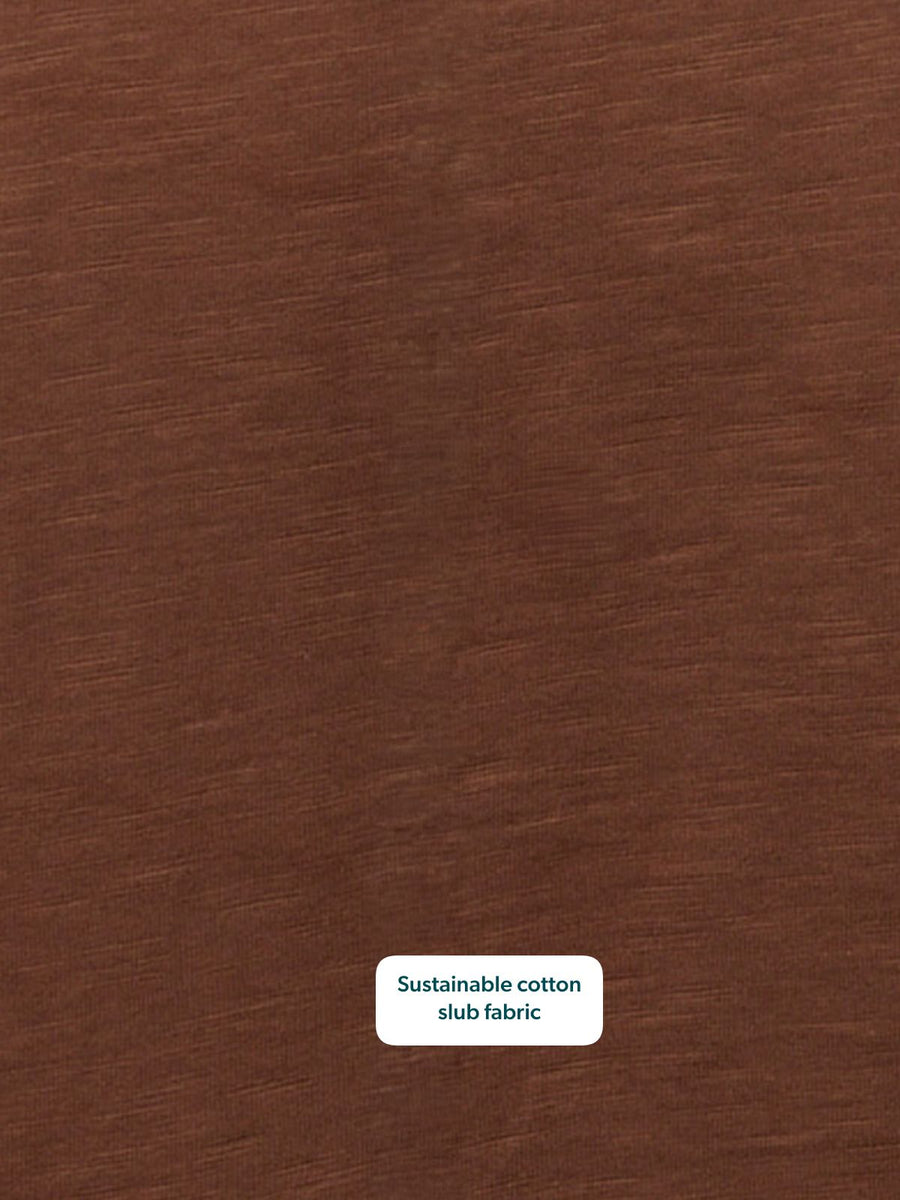 Close-up of Cathy V-neck Tee in brown sustainable cotton slub fabric, showing textured weave detail